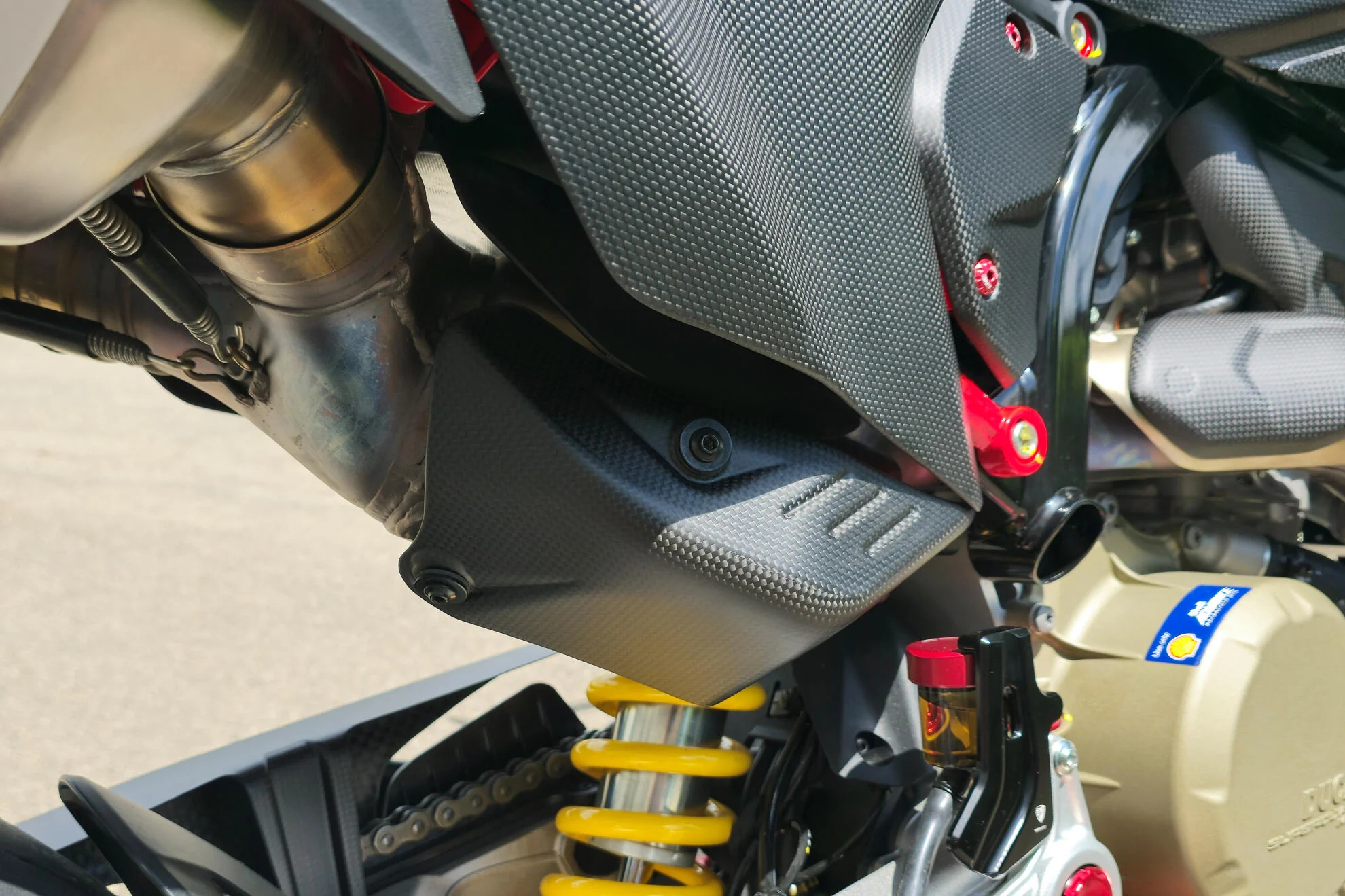 ZA276Y - CNC Racing Carbon Fiber Rear Exhaust Guard for the Ducati Hypermotard 698 Mono - Image 3